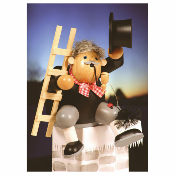 Räuchermann Lustiger Essenkehrer auf dem Schornstein sitzend